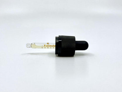 vanilleöl pipette weißer hintergrund